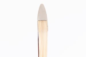 The head of a W. E. Hill & Sons bow - the maker’s mark hides on the silver faceplate under the hair