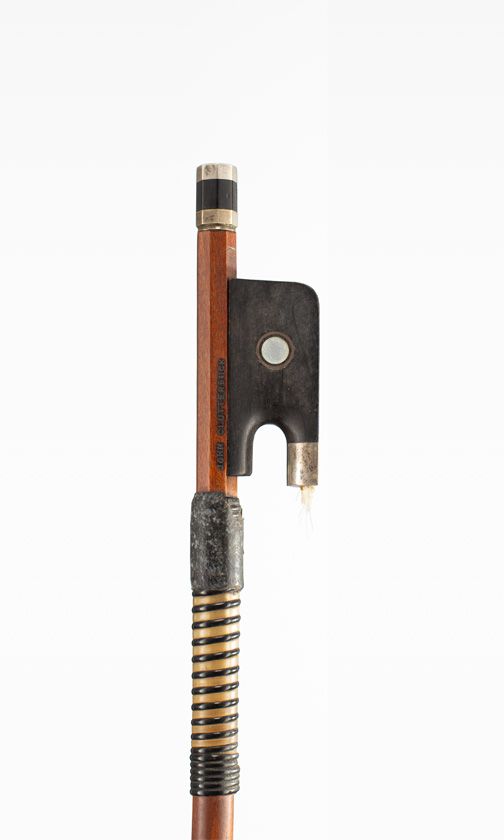 A silver-mounted cello bow by John Clutterbuck, Bicester — frog detail