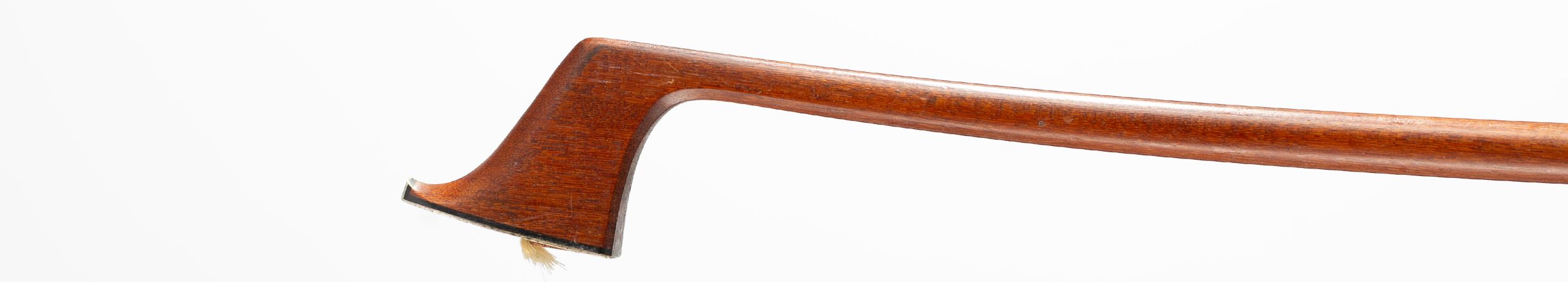 A silver-mounted cello bow by John Clutterbuck, Bicester — head