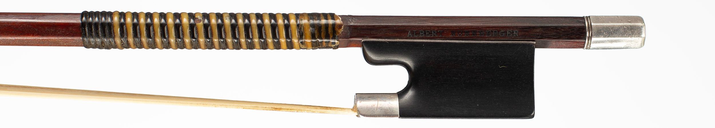 A silver-mounted violin bow by Albert Nürnburger, Germany — frog