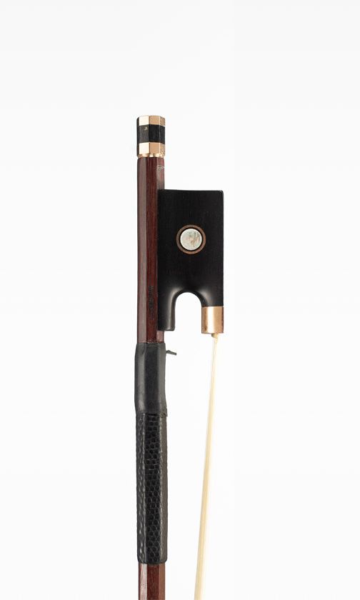 A gold-mounted viola bow by S. E. Bristow — frog detail