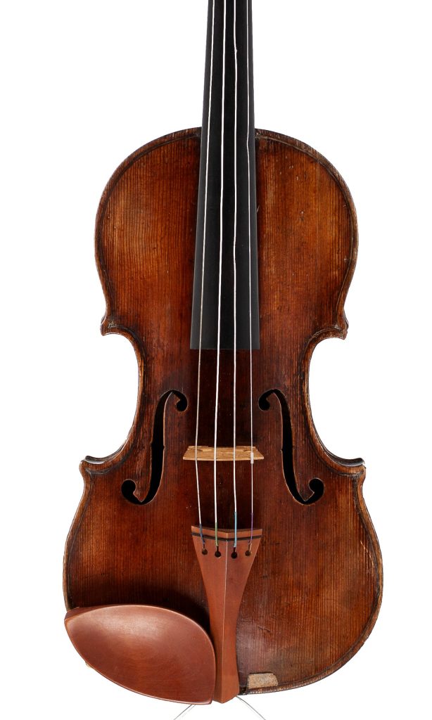 A violin by a member of the Guarneri family, ascribed to Giuseppe Filius and Giuseppe Del Gesu, Cremona, circa 1720 — front