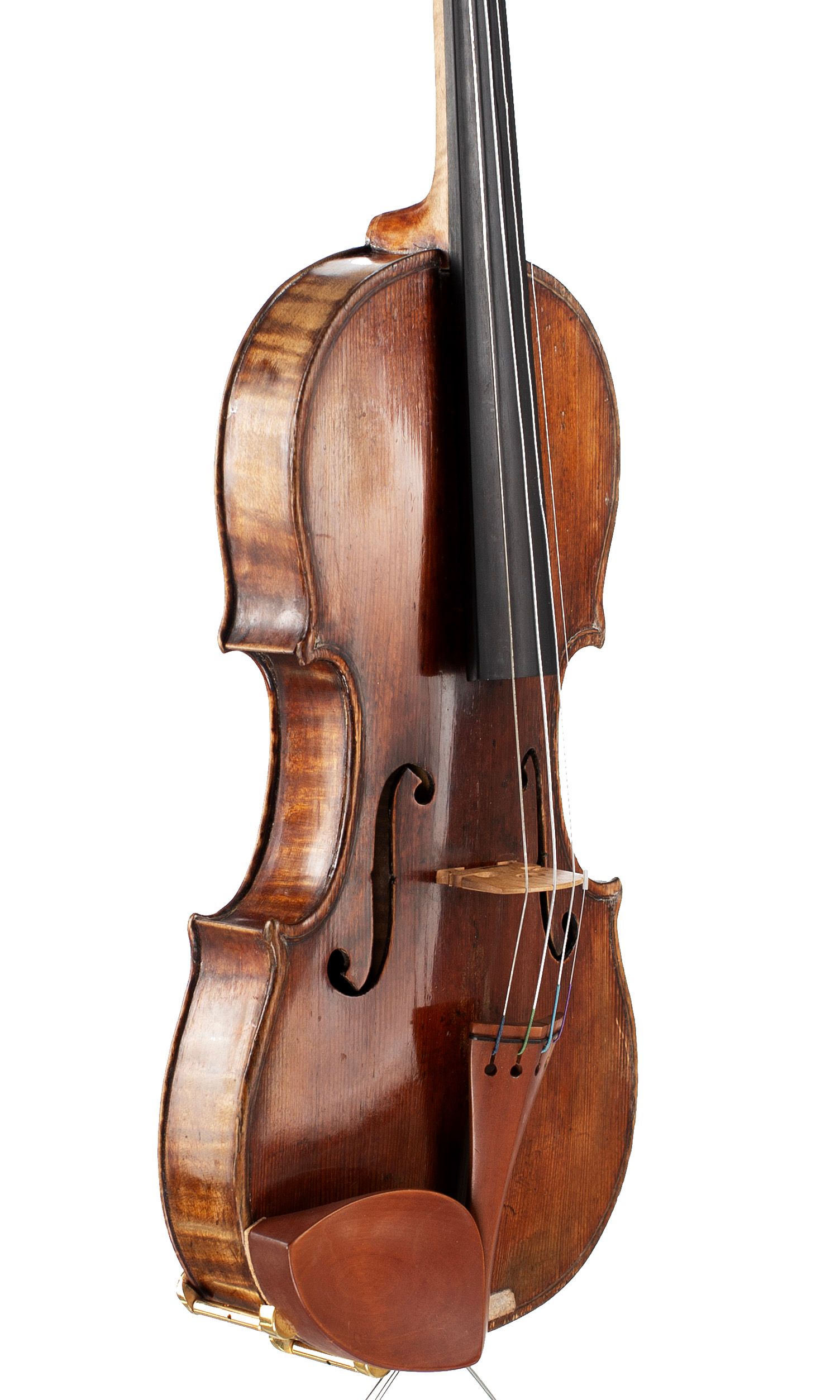 A violin by a member of the Guarneri family, ascribed to Giuseppe Filius and Giuseppe Del Gesu, Cremona, circa 1720 — angled view, 50°