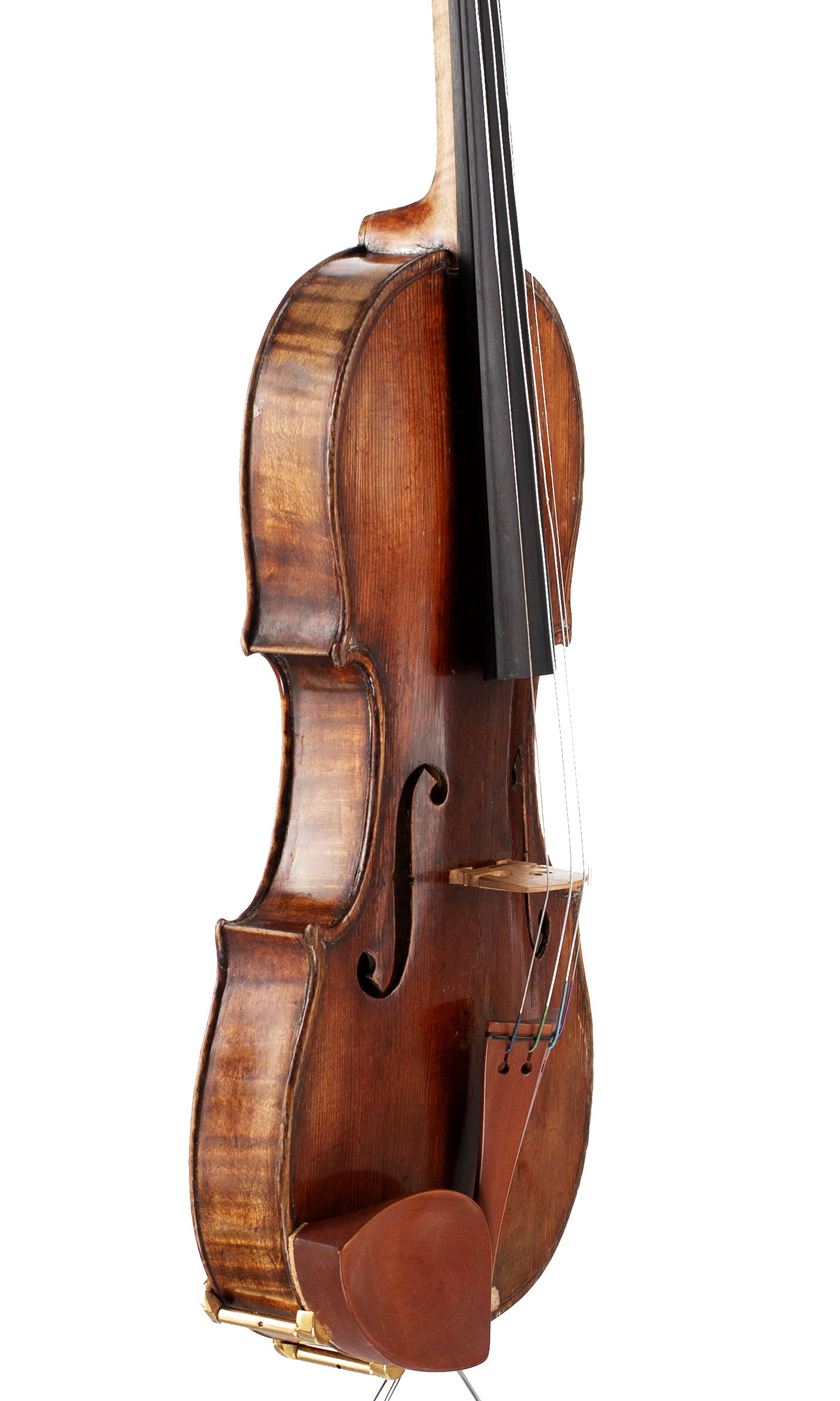 A violin by a member of the Guarneri family, ascribed to Giuseppe Filius and Giuseppe Del Gesu, Cremona, circa 1720 — angled view, 60°