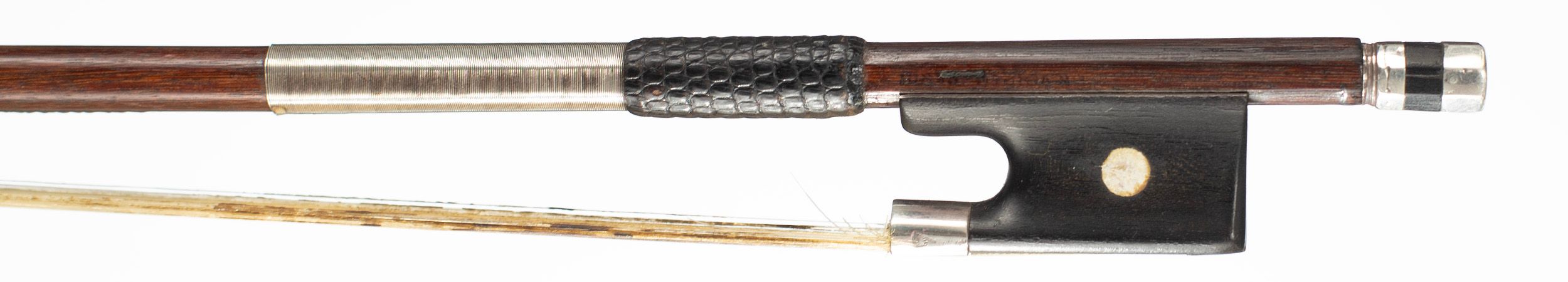 A silver-mounted violin bow by F. N. Voirin — frog