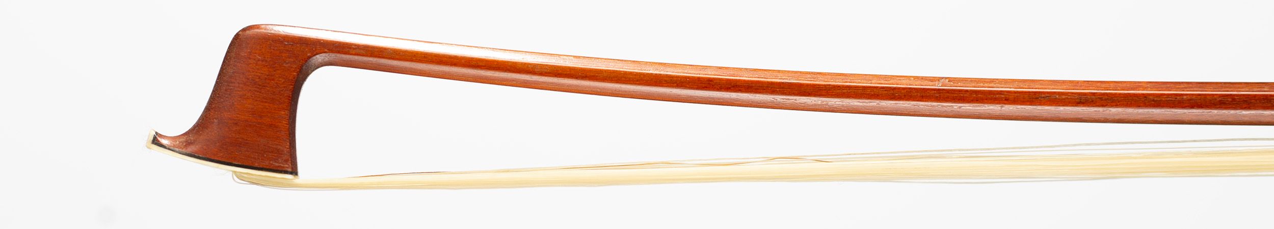 A silver-mounted violin bow by A. Herr Mönnig — head
