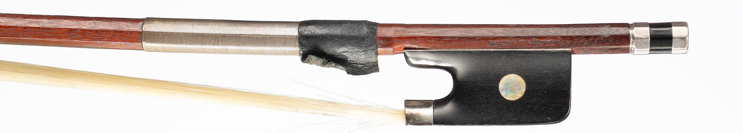 A silver-mounted cello bow by A. Lamy, Paris, circa 1910 — frog