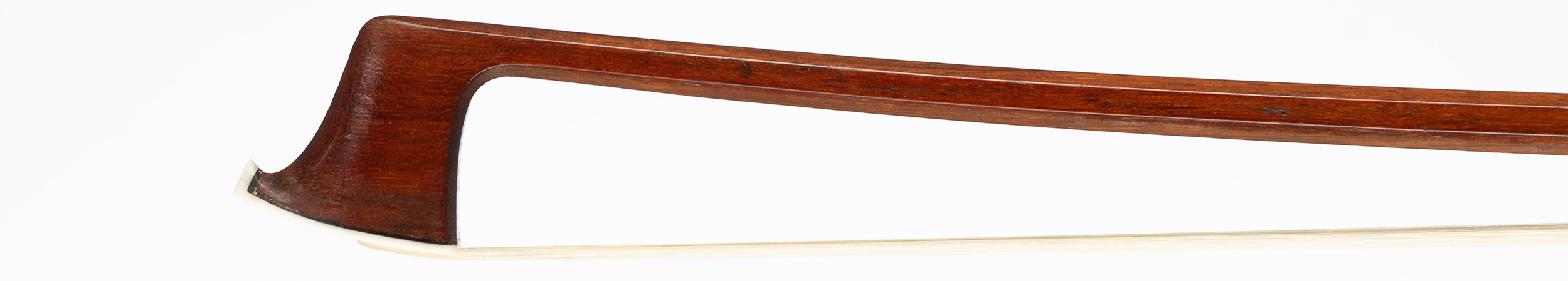 A nickel-mounted violin bow by a member of the Knopf Family, Germany, circa 1900 — head