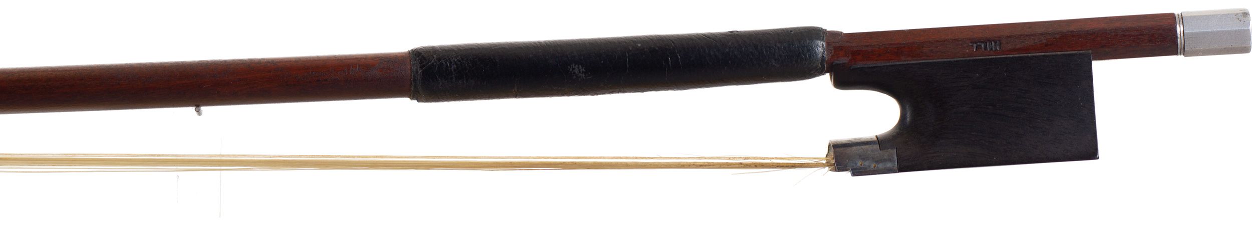 A white-metal-mounted violin bow by W. E. Hill & Sons, London — frog