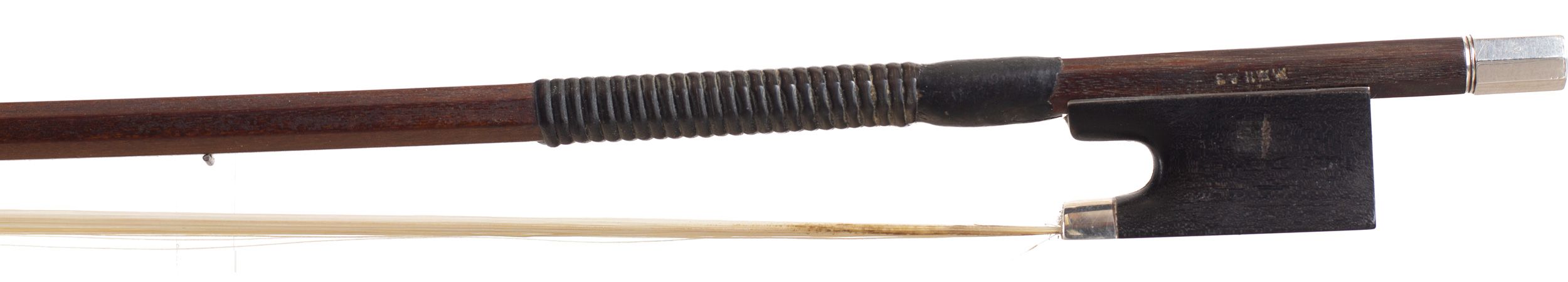 A silver-mounted violin bow by W. E. Hill & Sons, England — frog