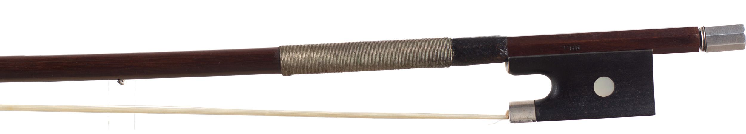 A silver-mounted violin bow by W. E. Hill & Sons, London — frog