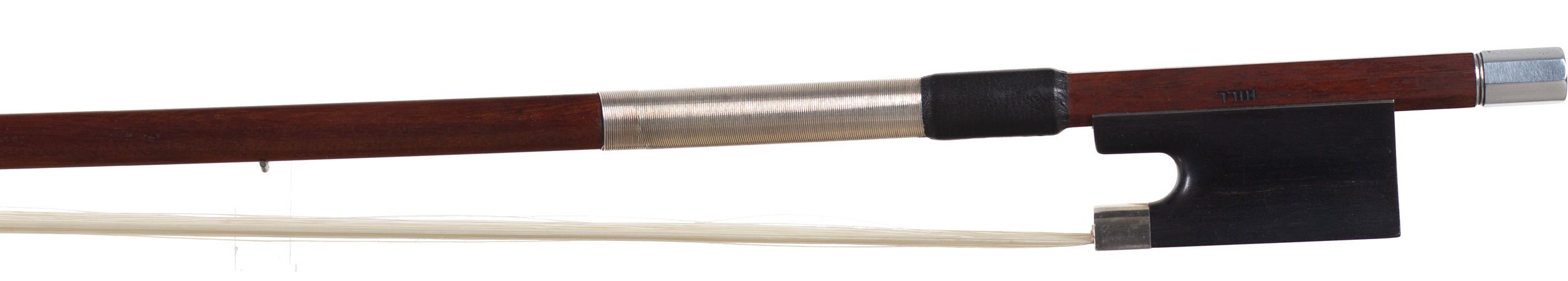 A silver-mounted violin bow by W. E. Hill & Sons, London — frog