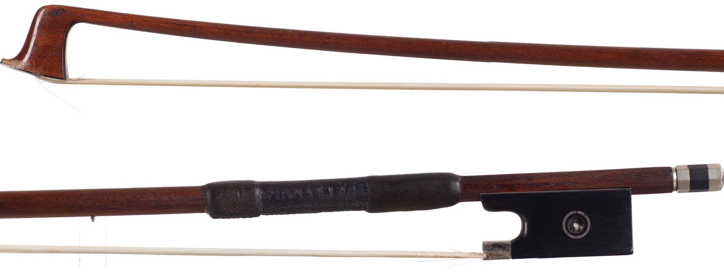 A silver-mounted violin bow by Claude Auguste Thomassin, Paris, circa 1910 — head and frog