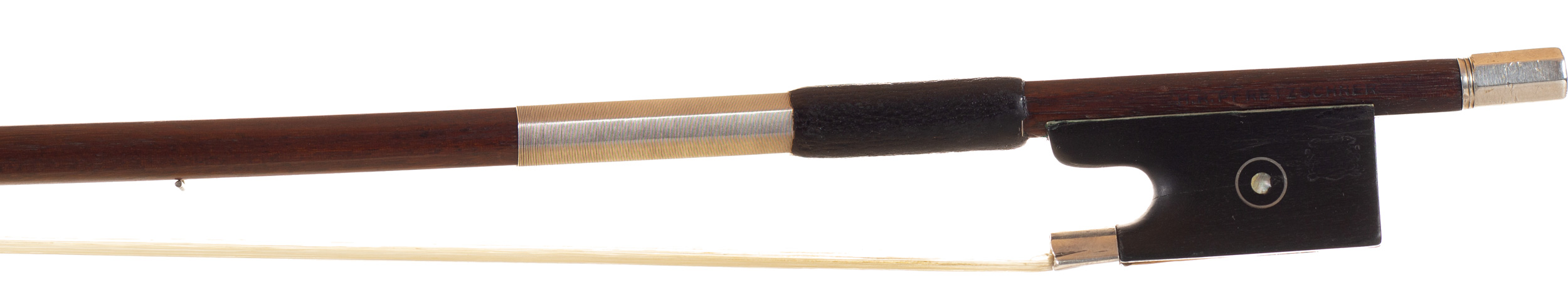 A nickel-mounted violin bow, by H. R. Pfretzschner — frog
