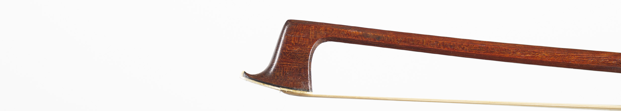 A silver-mounted violin bow by Gunter A. Paulus — head