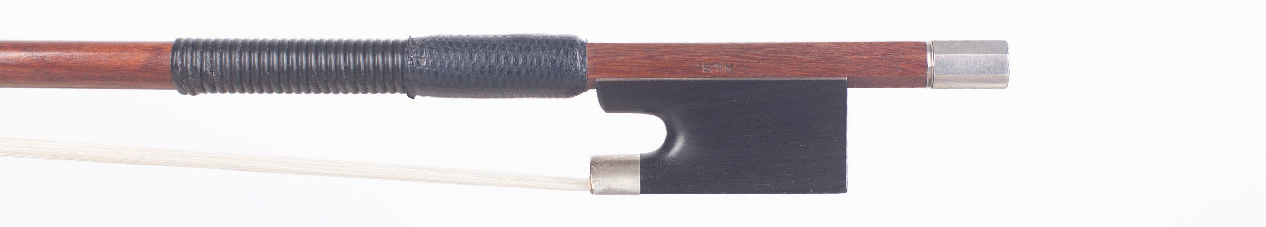 A silver-mounted violin bow by W. E. Hill & Sons, London — frog
