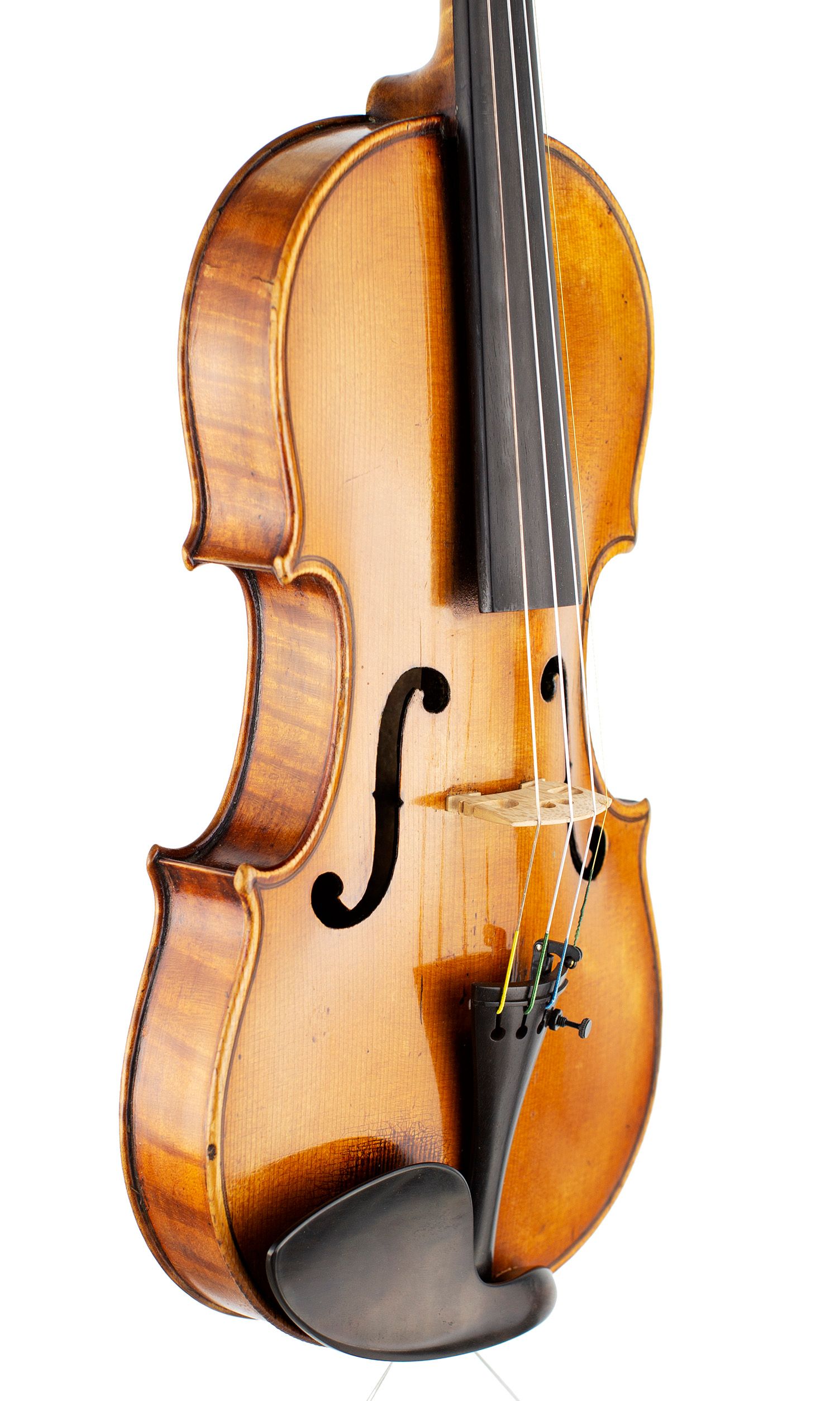 A violin by Ch. J. B. Collin-Mezin Pere, Mirecourt 1900 — angled view, 50°