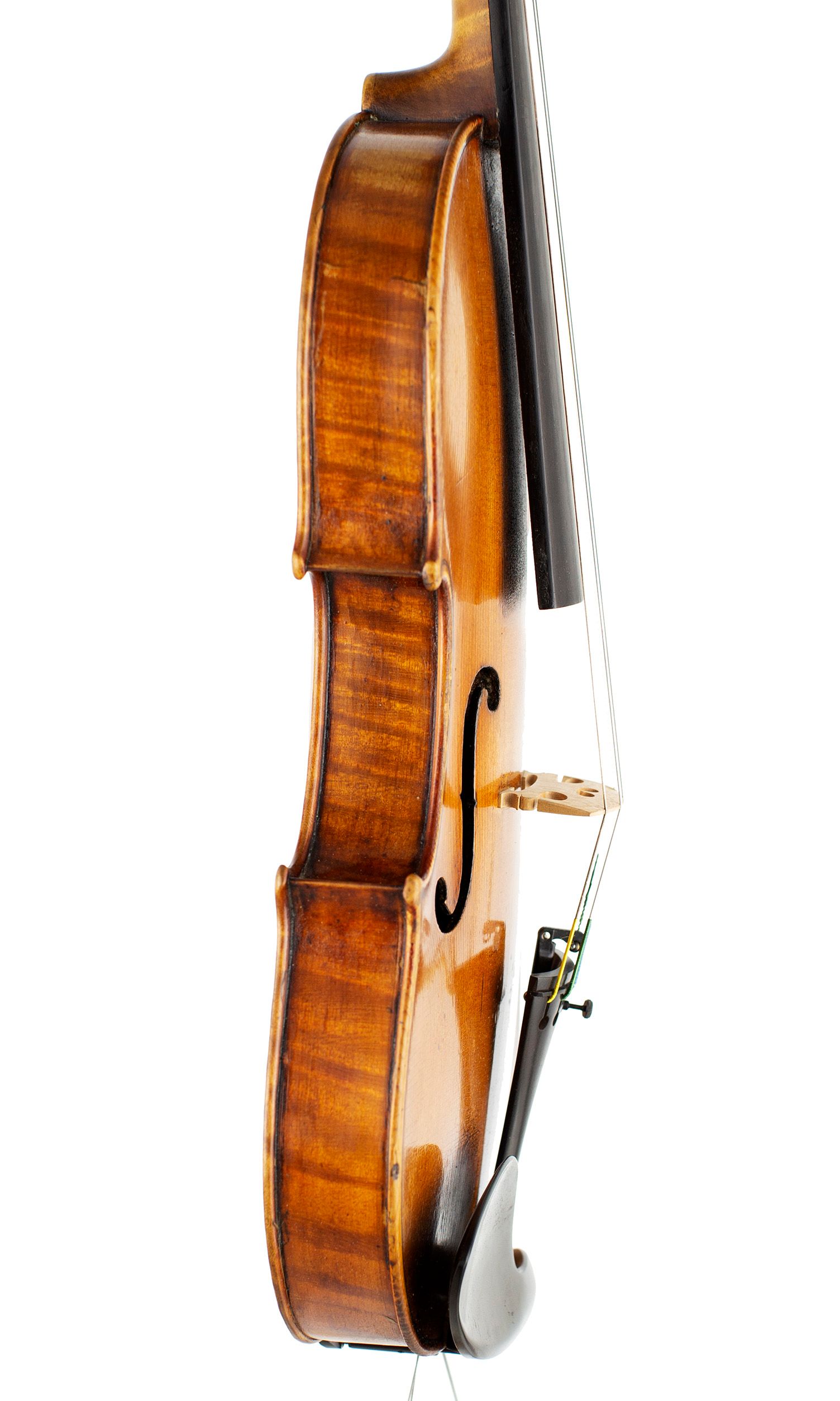A violin by Ch. J. B. Collin-Mezin Pere, Mirecourt 1900 — angled view, 80°