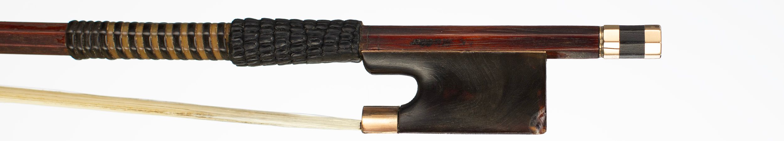 A gold and tortoiseshell-mounted violin bow by Friedrich Karl Muller, Markneukirchen, circa 1930 — frog