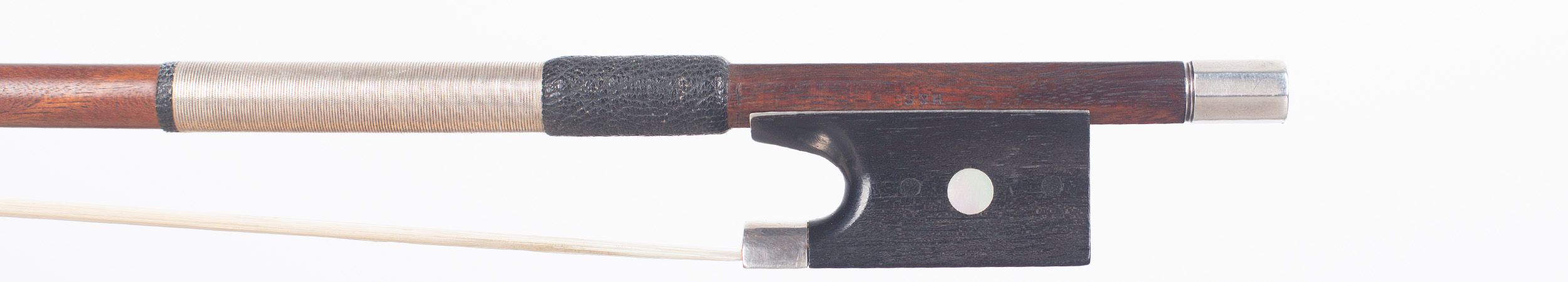 A silver-mounted violin bow by W. E. Hill & Sons, London — frog