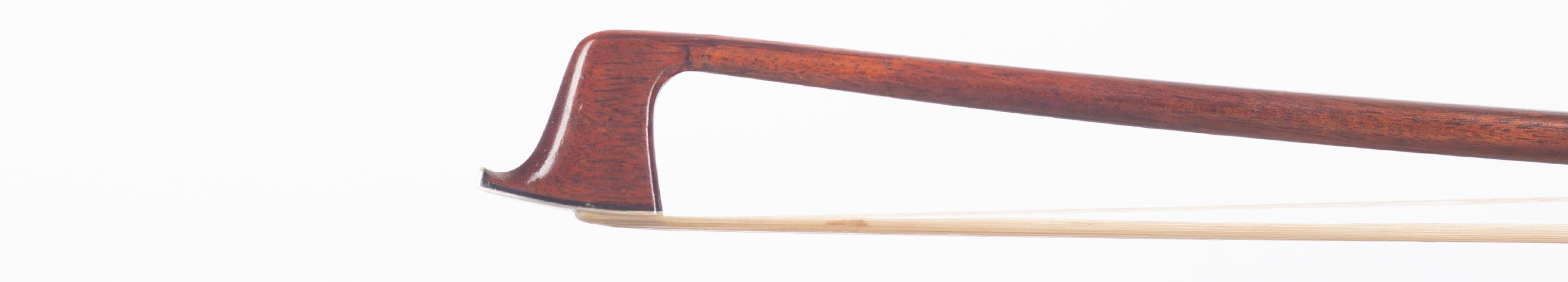 A silver-mounted violin bow by W. E. Hill & Sons, London — head