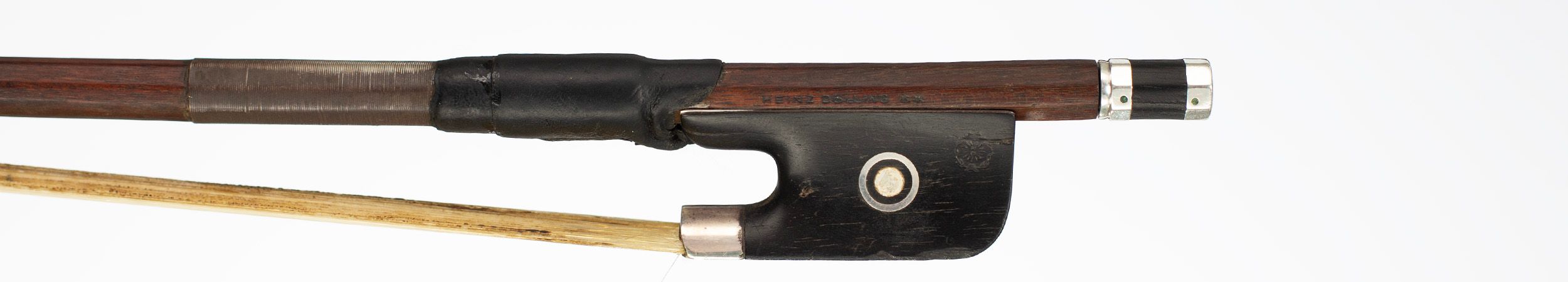 A silver-mounted cello bow by Heinz Dolling, Germany, circa 1920 — frog