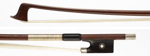 A silver-mounted violin bow by Claude Thomassin, Paris, circa 1910 — head and frog