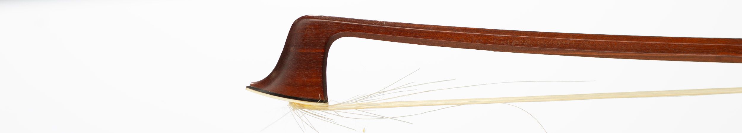 A silver-mounted violin bow by H. R. Pfretzschner, Germany, circa 1930 — head