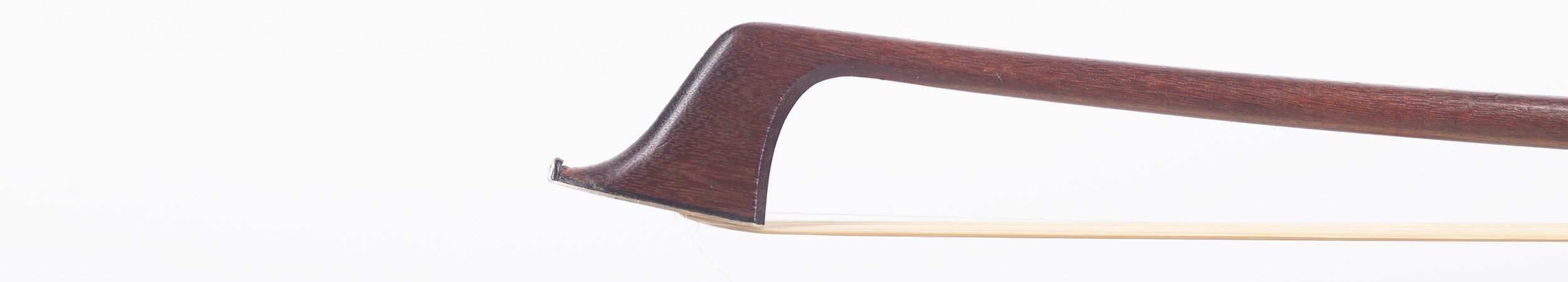 A silver-mounted cello bow by W. E. Hill & Sons, London — head