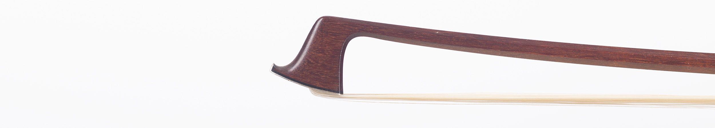 A silver-mounted violin bow by W. E. Hill & Sons, London — head