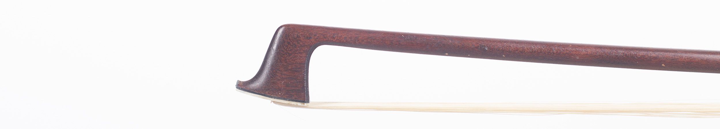 A silver-mounted violin bow by W. E. Hill & Sons, London — head