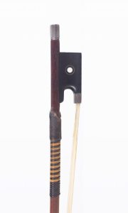 A silver-mounted violin bow by Bernard Ouchard, Geneva, 1954 — front