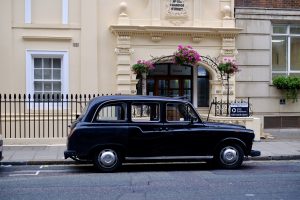 Winston, a 1990s Fairway London taxi, parked outside the Amati office in Chandos Street, London